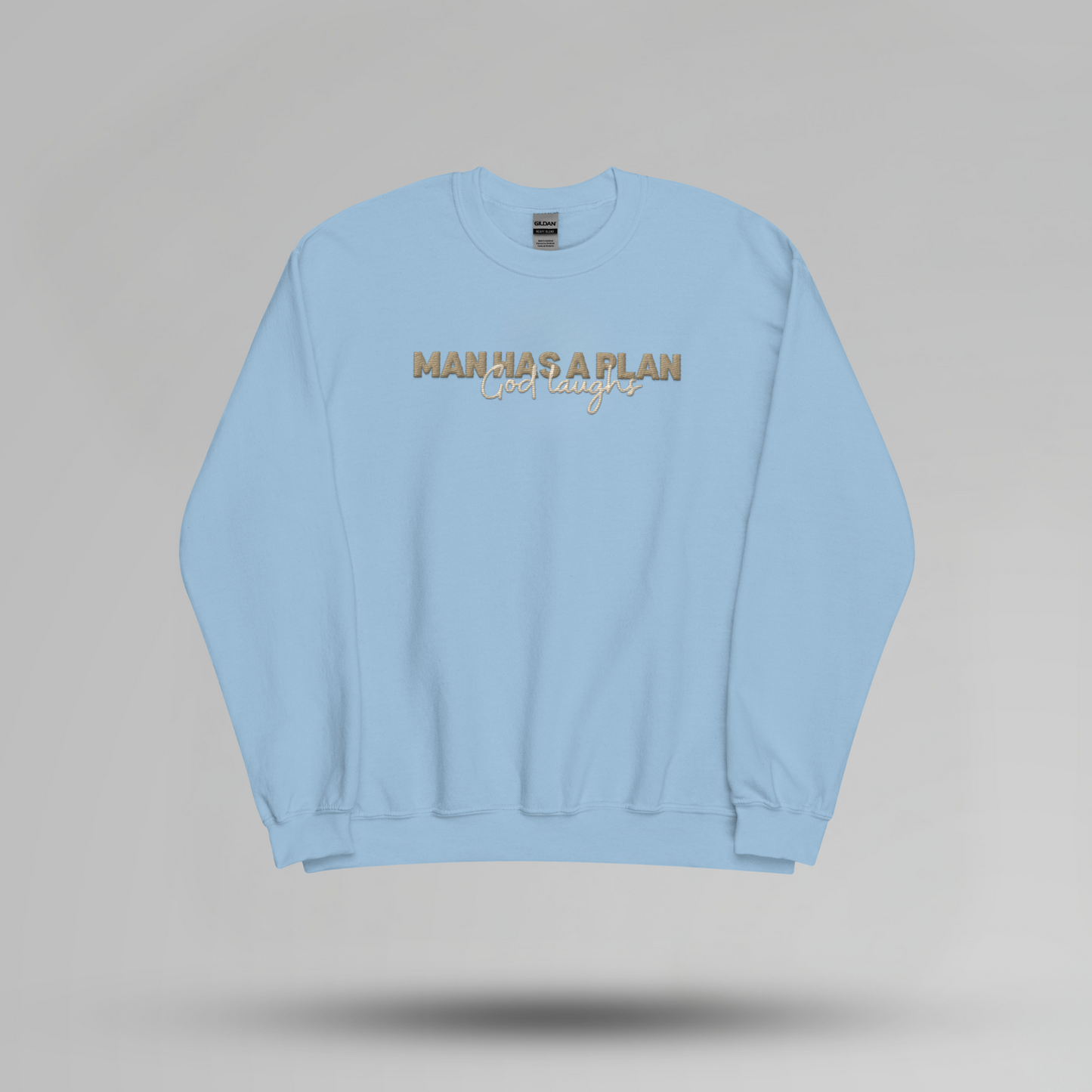 Man Has a Plan, God Laughs Embroidered Crewneck – Faith with a Sense of Humor - Designs by Smiley