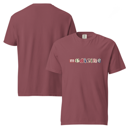 Maroon t-shirt with 'mediciné' text on a white background